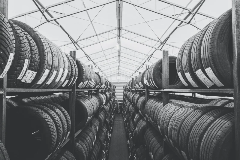 warehouse-full-of-car-tires-laid-out-on-the-shelve-2024-12-04-08-35-07-utc